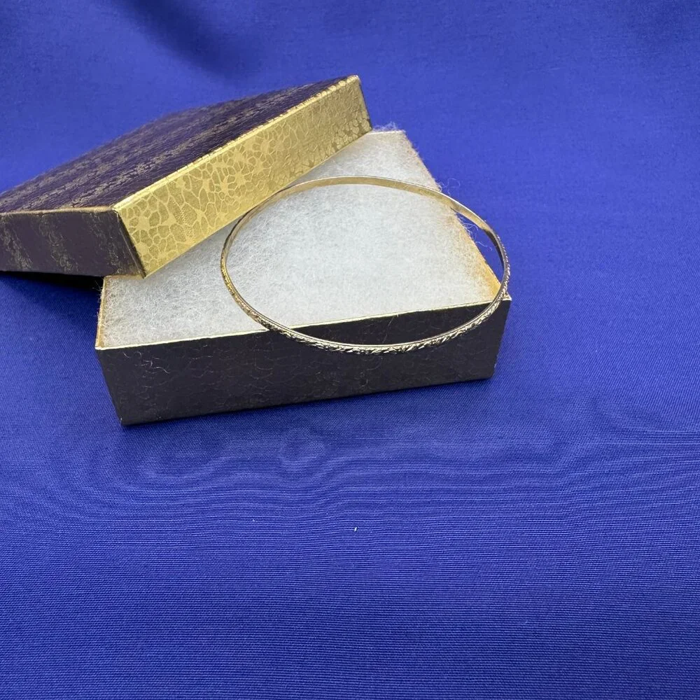 Elegant Gold-Tone Textured Bangle Bracelet - Women